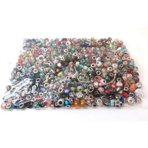 83 - 1.2kg of fashion charm beads includes Murano and 925 silver.