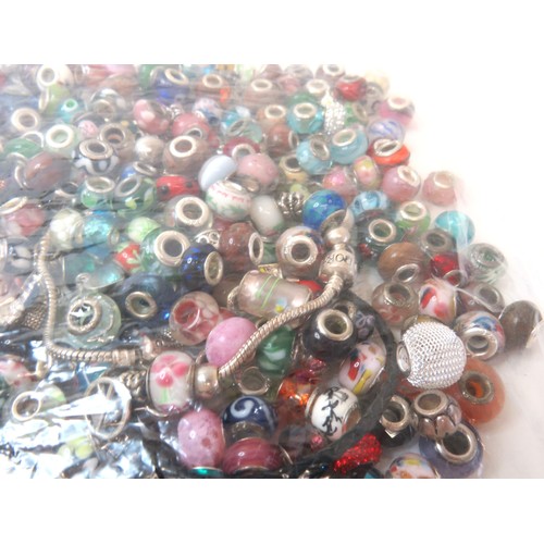 83 - 1.2kg of fashion charm beads includes Murano and 925 silver.