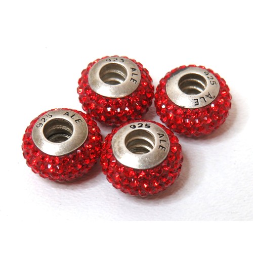 57 - Four Genuine Pandora red crystal pave beads.