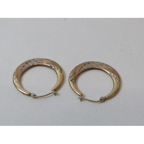 253 - Pair of boxed 9ct and silver loop earrings