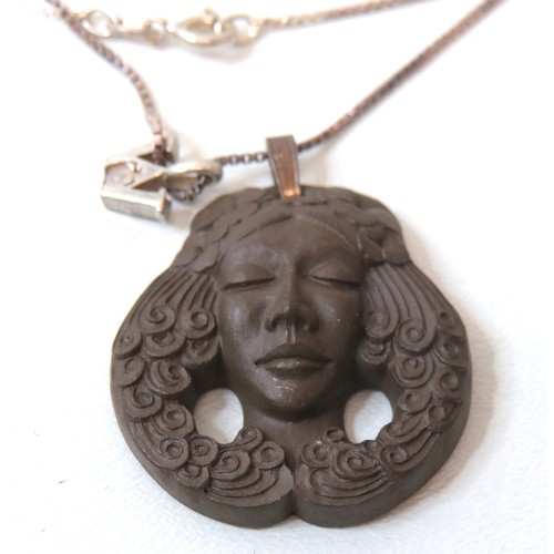 259 - Silver and ceramic goddess pendant boxed necklace