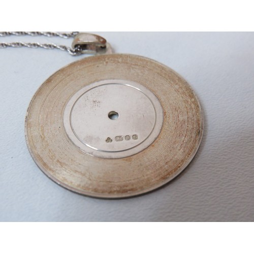 258 - Boxed silver LP record pendant necklace.