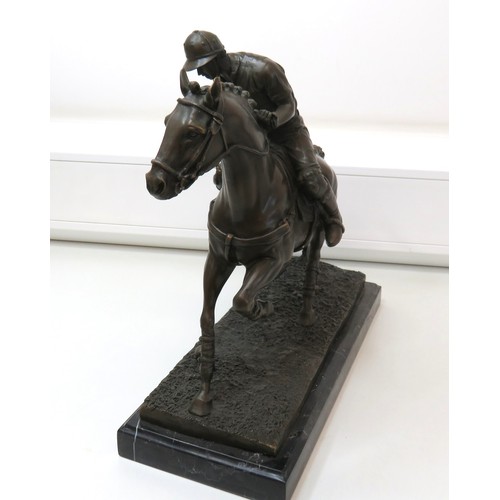 53 - Prince Charles playing polo a Hotcast signed bronze by the portuguese artist mitro on a solid marble... 