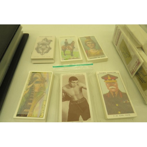 389 - Box of cigarette cards and two albums of re-prints