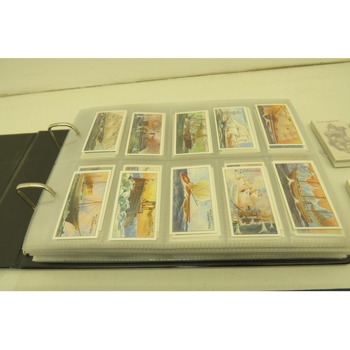 389 - Box of cigarette cards and two albums of re-prints