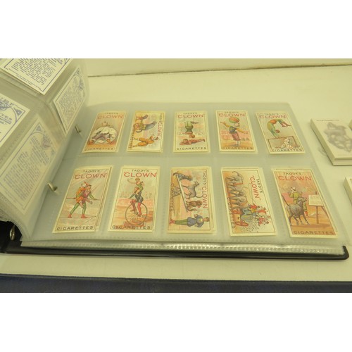 389 - Box of cigarette cards and two albums of re-prints