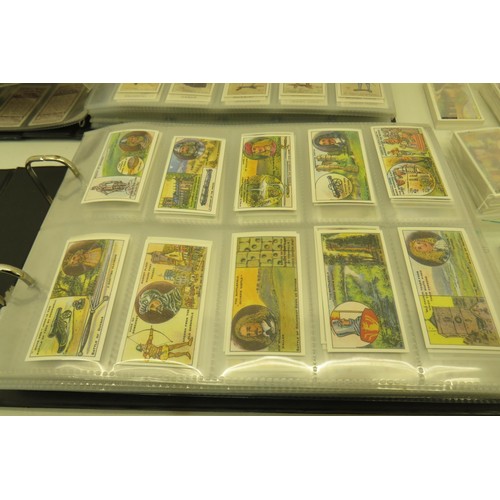 389 - Box of cigarette cards and two albums of re-prints