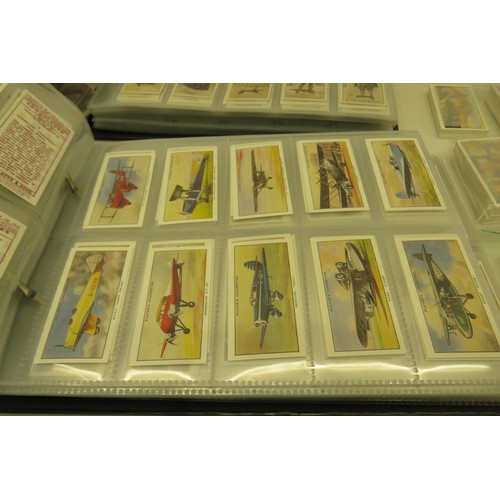 389 - Box of cigarette cards and two albums of re-prints