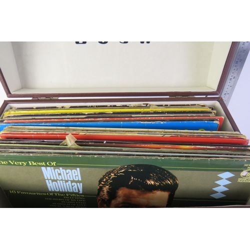 317D - Bush carry case full of assorted LP's