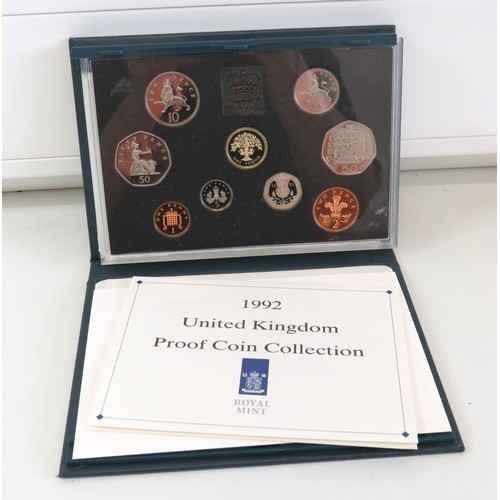 82 - 1992 UK Proof Coin Set collection with dual dated 1992/93 Fifty pence coin in blue folder.