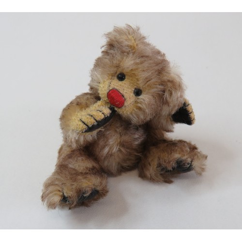 85 - Hermann of Germany Miniature 12cm jointed mohair thumb sucking teddy bear.