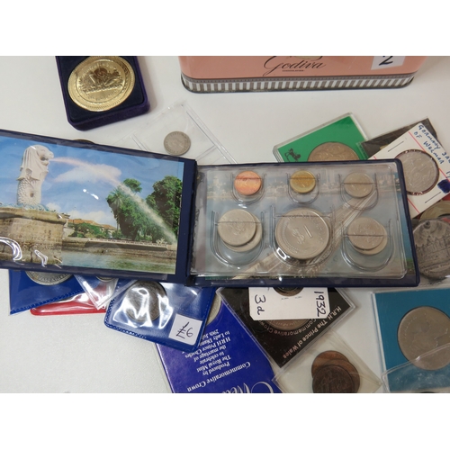 2 - Old tin full of various coins, tokens and medals.