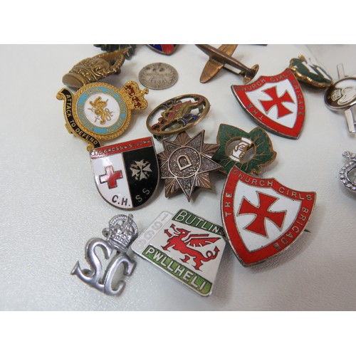 5 - Twenty-two old badges includes Military, Bradford Police, Butlins etc.