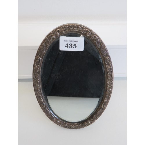 435 - Large sterling silver mounted mirror with mask decoration