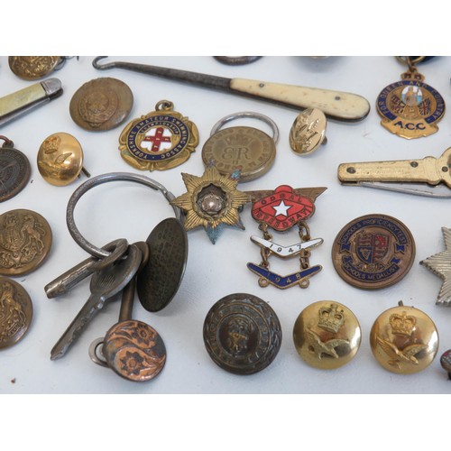 437 - Job lot of military badges and buttons