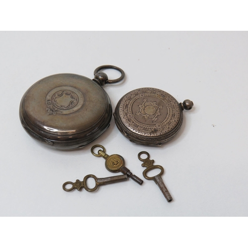 24 - Two sterling silver pocket watches with keys - as found