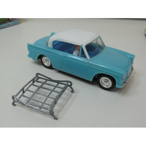 28 - Telsada sunbeam rapier saloon friction car and matchbox ford tractor- both boxed