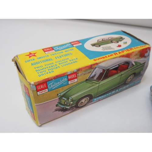 28 - Telsada sunbeam rapier saloon friction car and matchbox ford tractor- both boxed