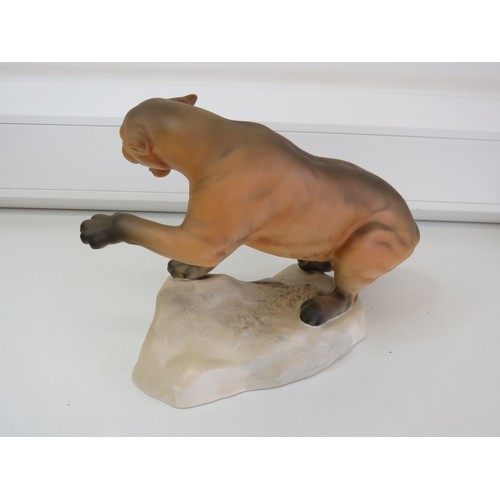 33 - 1970's Beswick Puma/Mountain Lion on a rock figurine.