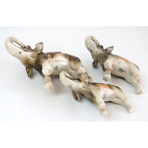 40 - Set of three Royal Dux elephant figurines.