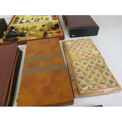 400 - Eight vintage backgammon and other sets including 1970's and extra pieces