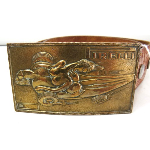 61 - A rare 1970's Gucci brass belt buckle with erotic Pirelli motoring design by Salvador Dali on leathe... 