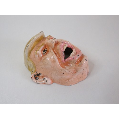 92 - A novelty Donald Trump cast iron bottle opener.