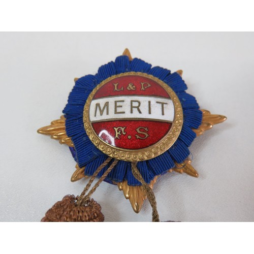 95 - Vintage enamelled Merit medal with tassels.