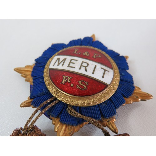 95 - Vintage enamelled Merit medal with tassels.