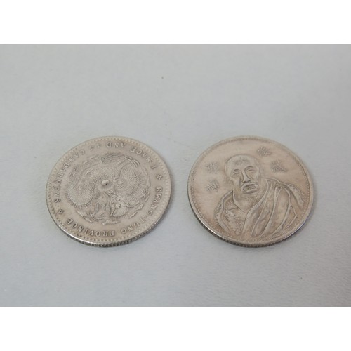 104 - Two oriental silver coins