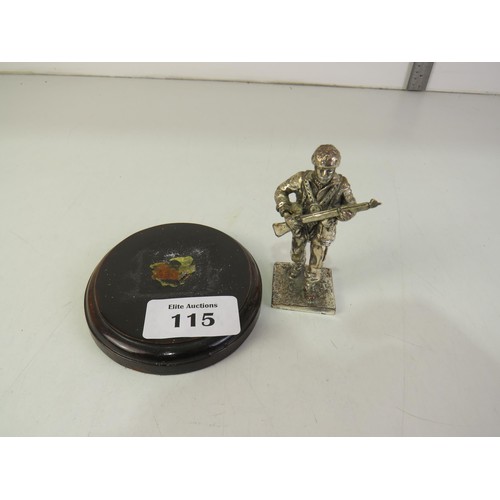 115 - Plated commando figure