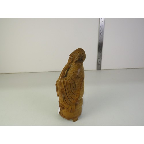 125 - Chinese carved wooden figure