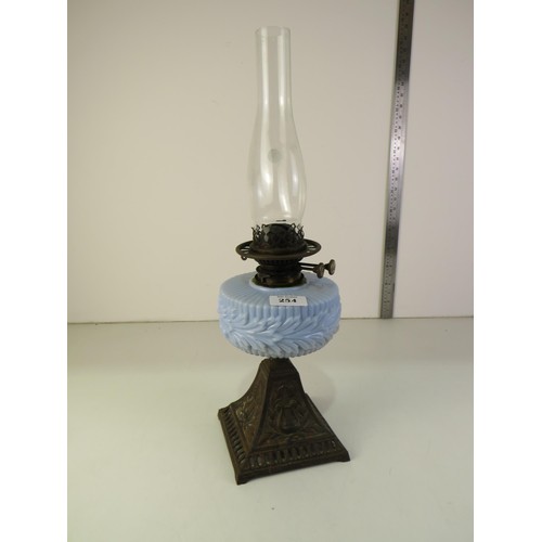 254 - Blue glass oil lamp