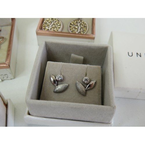 203 - Five pairs of Unique & Co 925 silver earrings - boxed as new with bag.