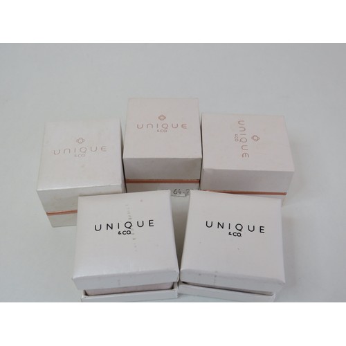 203 - Five pairs of Unique & Co 925 silver earrings - boxed as new with bag.