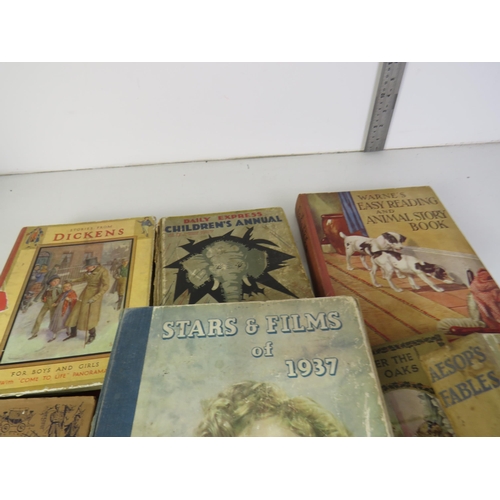 302 - Vintage childrens fiction books to include Wizard of Oz, Enid Blyton Fourth Holiday Book, Paul and P... 