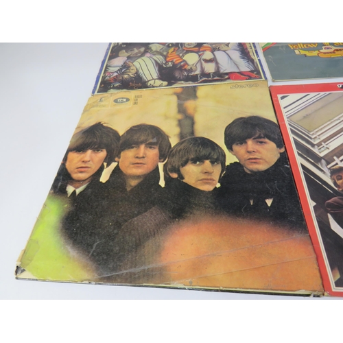 136 - Four assorted Beatles LP's