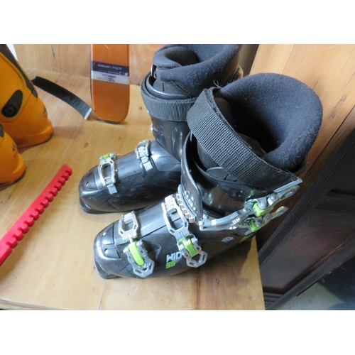 334 - Solomon skis and boots, Nike ice skates, Nordica and Wedze ski boots