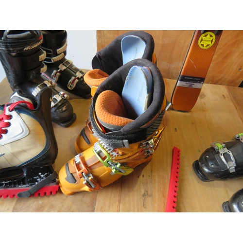 334 - Solomon skis and boots, Nike ice skates, Nordica and Wedze ski boots