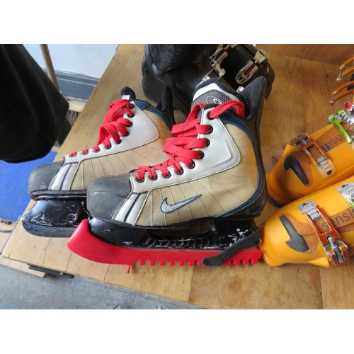 334 - Solomon skis and boots, Nike ice skates, Nordica and Wedze ski boots