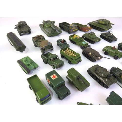 276 - Military diecast to include Dinky Toys, Tanks, Artillery field guns etc.