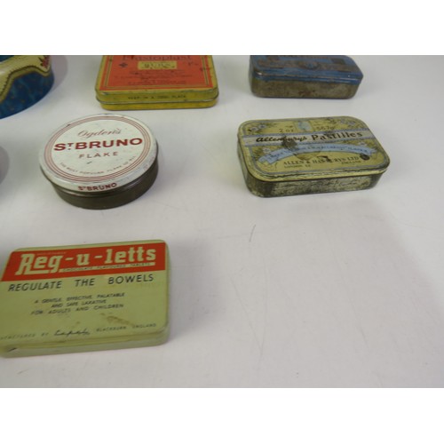 298 - Selection of vintage tins.