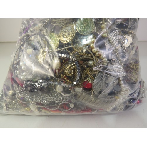 227 - 10kg bag of unsorted costume Jewellery.