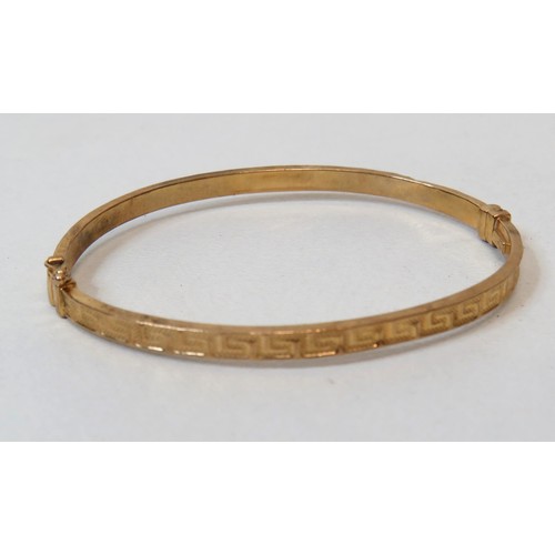 33 - 9ct Gold Greek Key Design hinged opening bangle.
Weight 3.7g