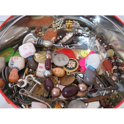 4 - Tin full of miscellaneous items to include corkscrews, whistles, coins etc