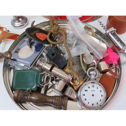 4 - Tin full of miscellaneous items to include corkscrews, whistles, coins etc