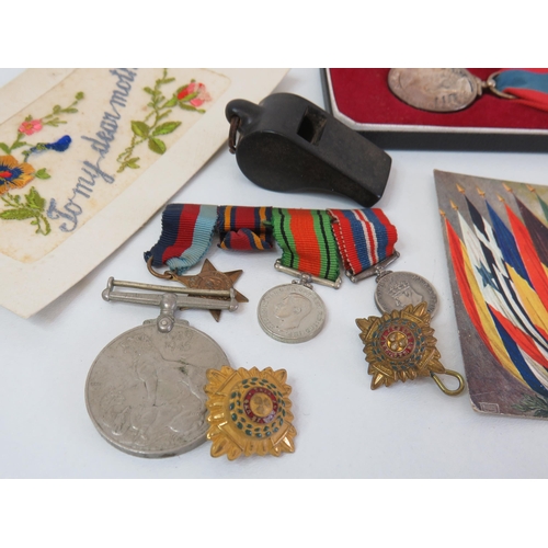 41 - Collection of cap badges, military postcards, miniature WWII set and imperial service and other WWII... 