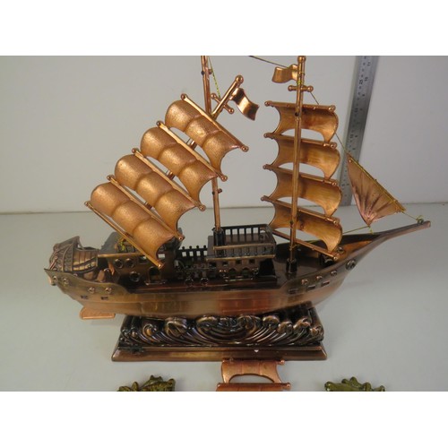 423 - Brass fireside ornaments and ship lighter