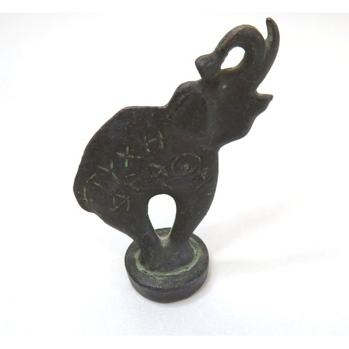 63 - Vintage cast metal/bronze elephant Opium weight, height 8.5cms.