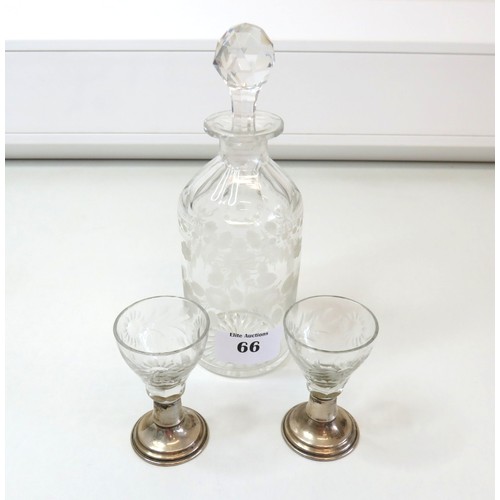 66 - Antique floral etched crystal decanter with stopper and a pair of etched crystal glass with silver s... 